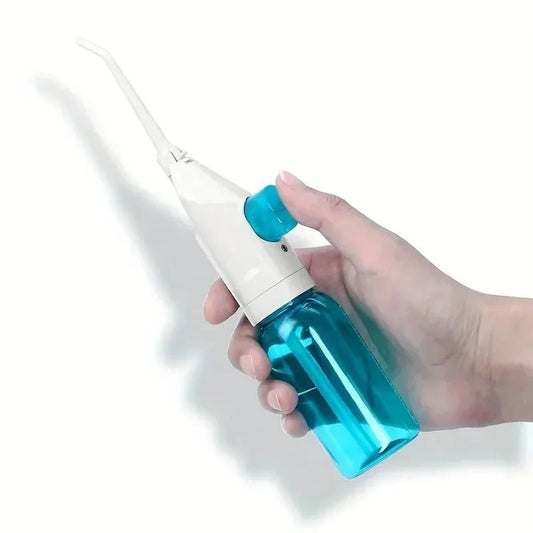 Irrigador bucal portátil Nexorretail con chorro manual para limpieza profunda de dientes y encías, en color negro.