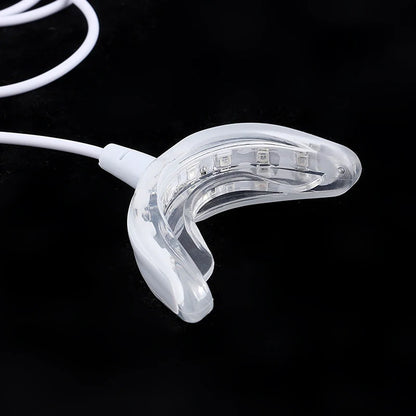 Lámpara blanqueadora de dientes Nexorretail con 16 LED y férula dental portátil conectada por USB.