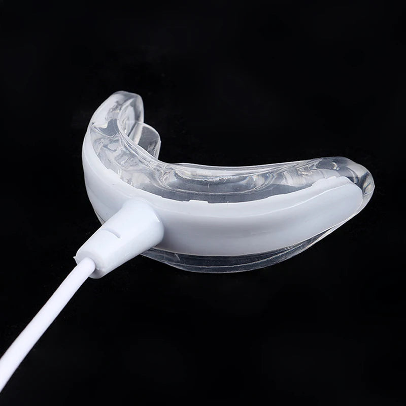 Lámpara blanqueadora de dientes Nexorretail con 16 LED y férula dental portátil conectada por USB.