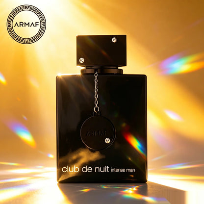 Perfume Armaf Club de Nuit Intense Man 105ml, botella de Eau de Toilette con frasco transparente y tapa negra.