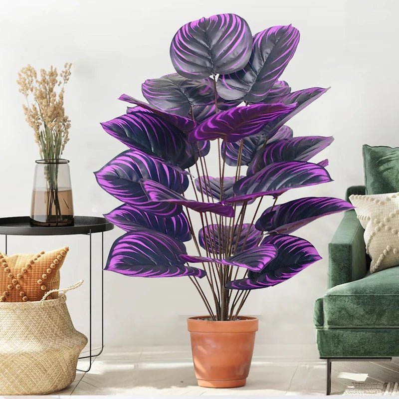 Planta artificial Monstera exótica de 57 cm con hojas violetas y negras, decorativa y de tacto real para hogar o jardín.