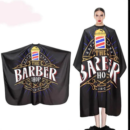Capa de peluquería y barbería profesional Nexorretail en color negro, tela resistente para cortes de cabello y peinados vintage.