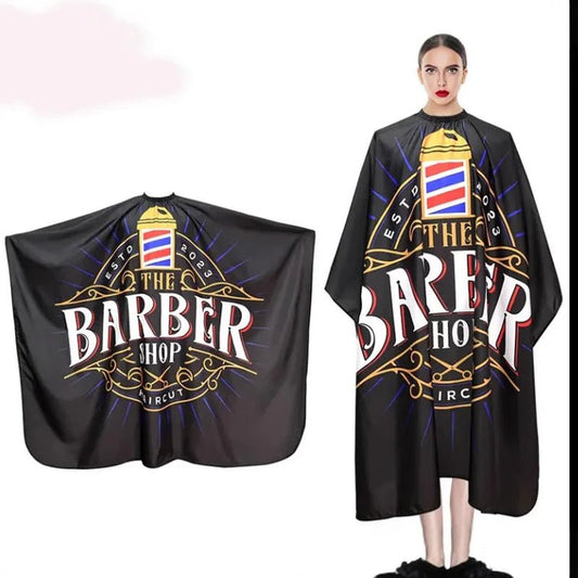 Capa de peluquería y barbería profesional Nexorretail en color negro, tela resistente para cortes de cabello y peinados vintage.