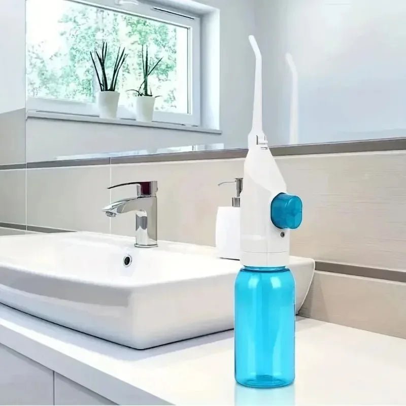 Irrigador bucal portátil Nexorretail, limpiador de boca manual con chorro pulsado para limpieza profunda de dientes y encías.