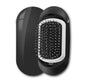 Cepillo iónico eléctrico portátil Nexorretail con masajeador de vibración para cabello suave y brillante, ideal para viajes.