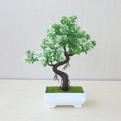 Bonsái artificial en maceta, árbol pequeño decorativo para hogar y jardín, con follaje verde y maceta negra.