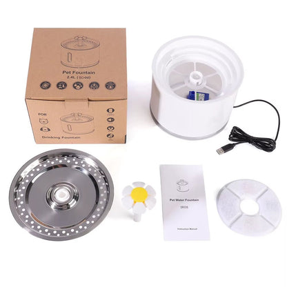 Bebedero automático para gatos y perros Nexorretail, con filtro, iluminación LED, capacidad de 2.4L y funcionamiento silencioso.